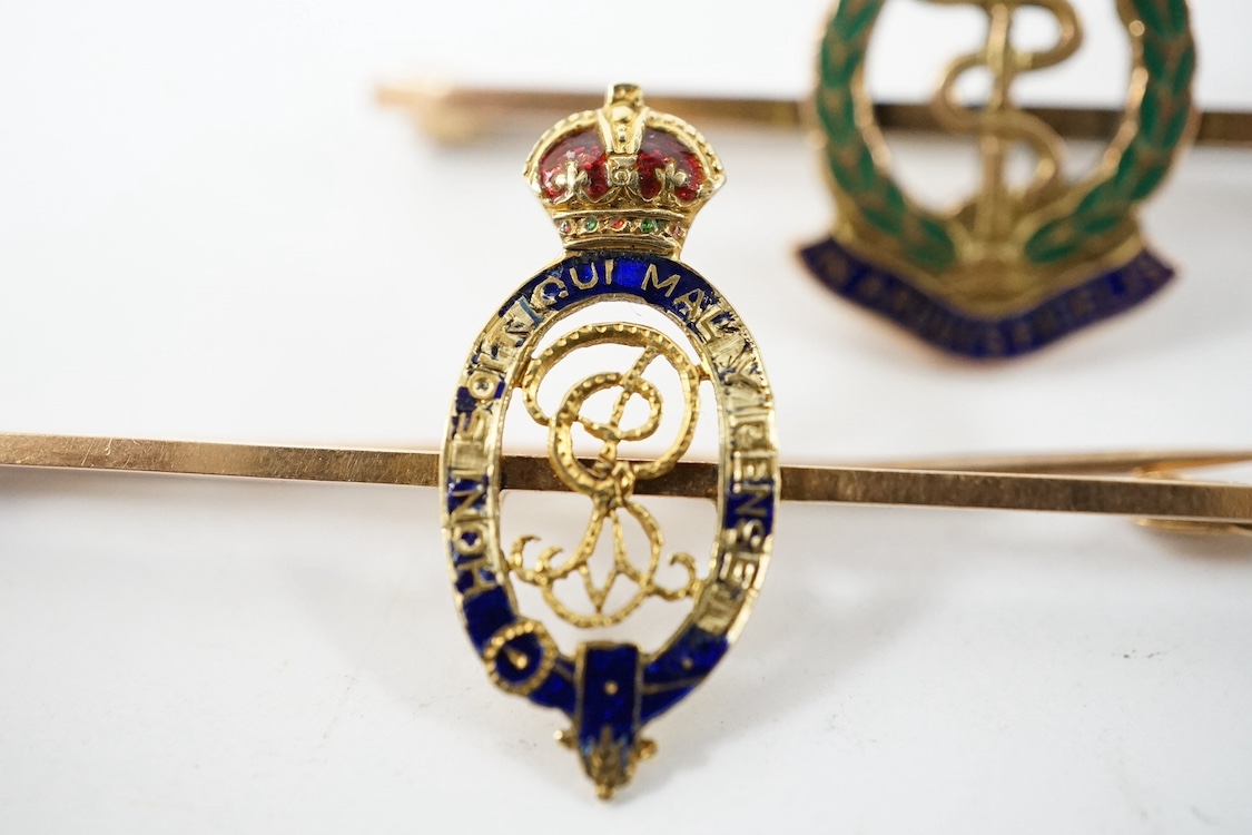 Two WWII sweetheart brooches; a RAMC brooch stamped 9ct.(?) and another badge stamped 15ct. Condition - poor to fair, damage to the enamel.
